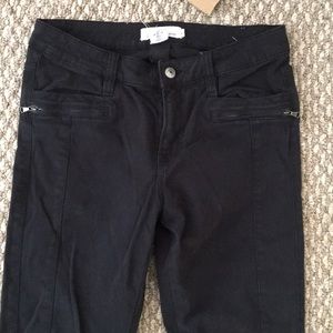 Black jeans with zippers